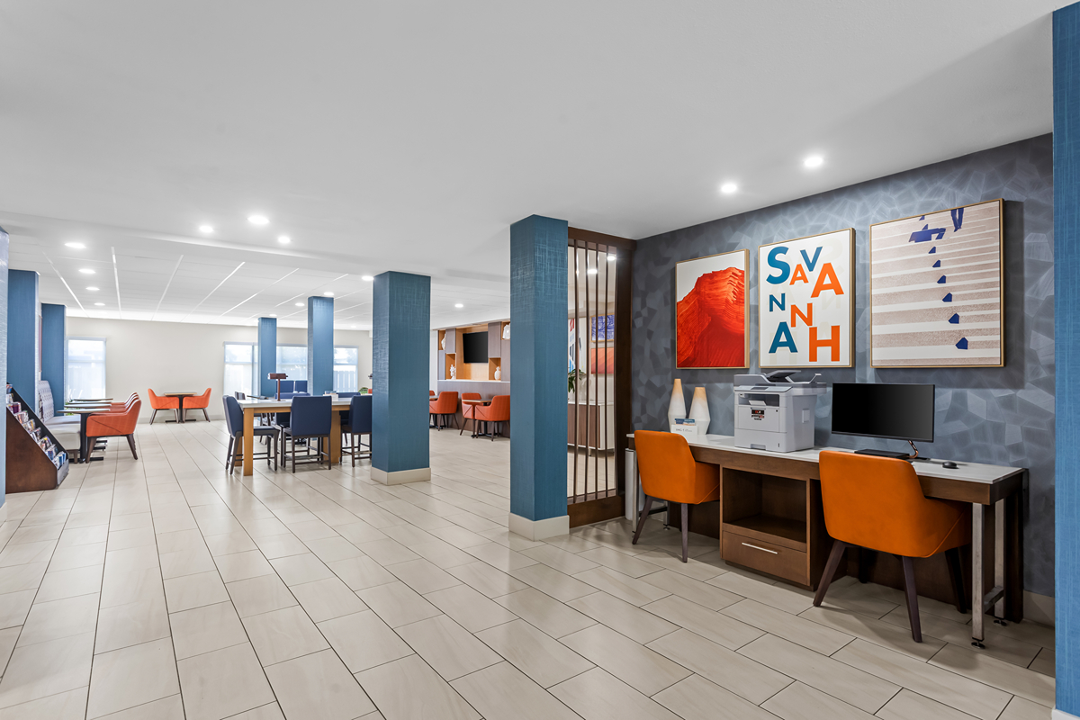 Business center with computers and workspace