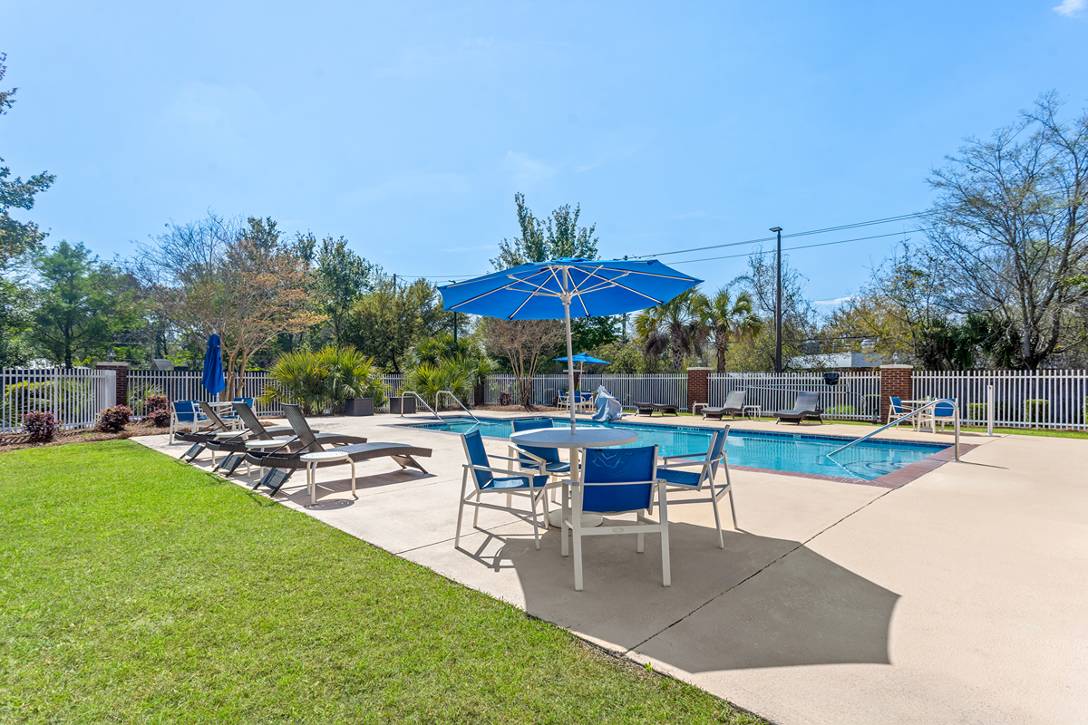 Outdoor swimming pool with lounge chairs